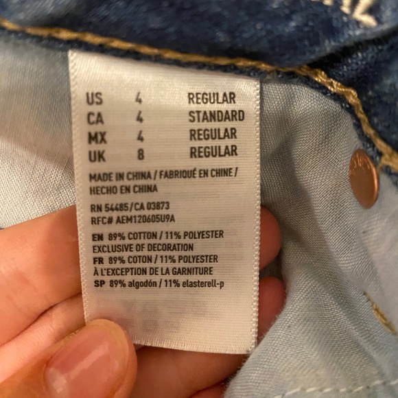 Ripped blue jeans - Picture 3 of 4